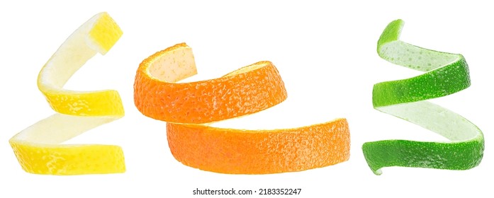 Citrus zest spirals - fresh peel of lemon, lime and orange fruit isolated on a white background. 