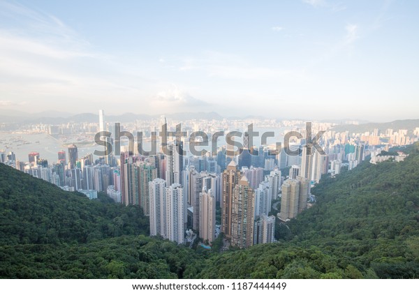 a city in asia with traffic and a river\
between skyscrapers
