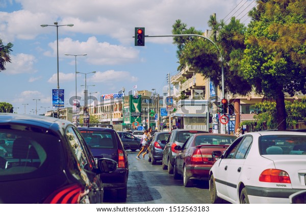 City Athens, Greek\
Republic. Urban city street life with cars and peoples.  11. Sep.\
2019. Travel photo.