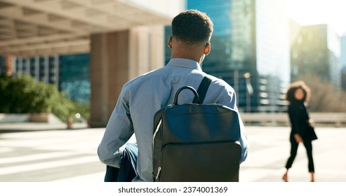 City, back and business person walking on outdoor urban journey, commute and businessman on way to office building. Backpack, morning and professional agent on morning travel to work in Chicago, USA - Powered by Shutterstock