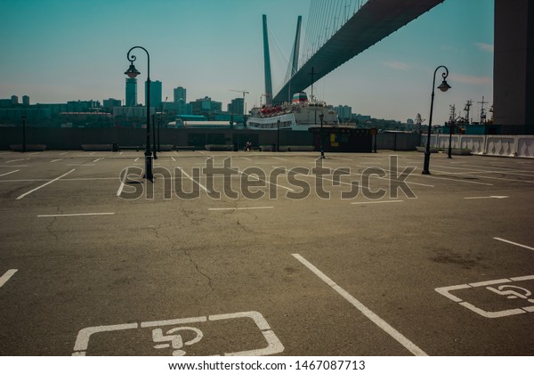 City bridge over the\
disabled car park