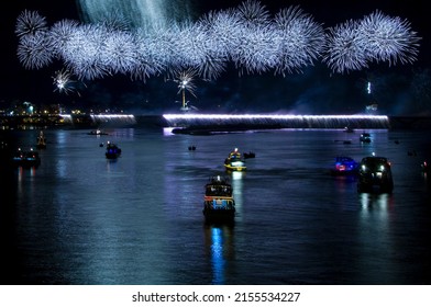 City Brilliant Fireworks In The Riverside Night Sky