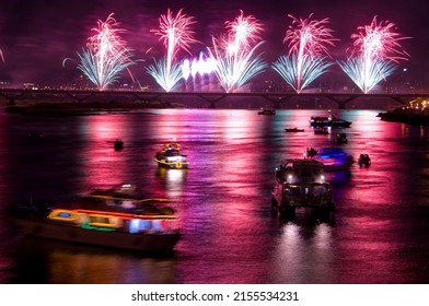 City Brilliant Fireworks In The Riverside Night Sky