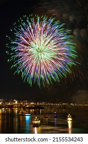 City Brilliant Fireworks In The Riverside Night Sky