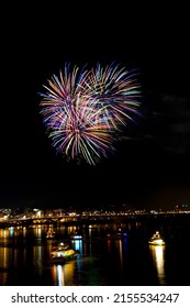 City Brilliant Fireworks In The Riverside Night Sky