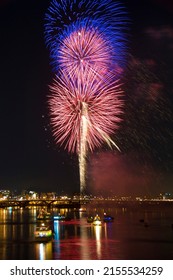 City Brilliant Fireworks In The Riverside Night Sky