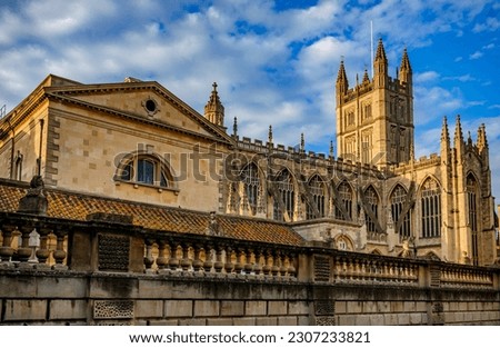 City buildings and Bath Abbey in Bath England