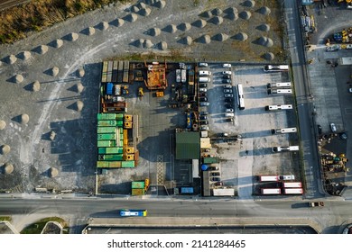 City Bus Storage And Repair Facility. Aerial Top Down View. Nobody. Small Piles Of Sand On The Ground.