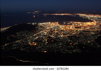 The City Of Cape Town In South Africa At Night As Seen From Table Mountain.