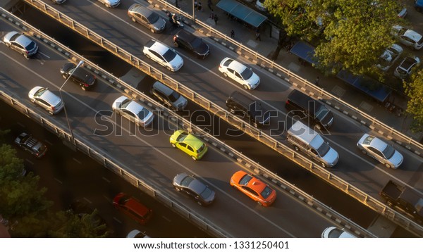 A lot of city car on the\
road step