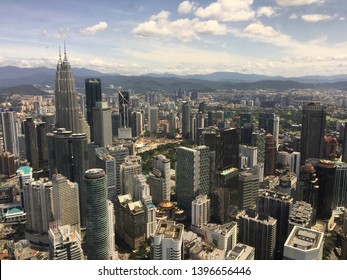 City Centre, Kuala Lumpur, Malaysia - Jan 23rd, 2019: The view from the top of Kuala Lumpur Tower (KL Tower) and its Surroundings with clear blue sky and white cloud during the afternoon 