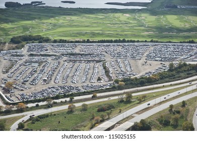 The City Of Chicago Impound Lot For Vehicles On A Cloudy Day.