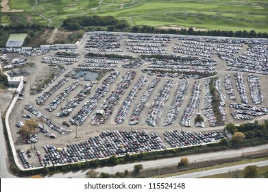 The City Of Chicago Impound Lot For Vehicles On A Cloudy Day.