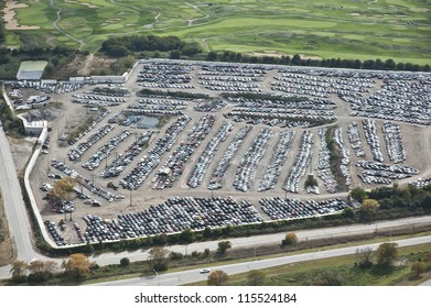 The City Of Chicago Impound Lot For Vehicles On A Cloudy Day.