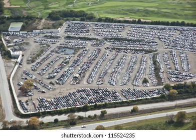 The City Of Chicago Impound Lot For Vehicles On A Cloudy Day.