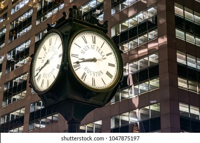 City Clock In Downtown Houston (Intersection Of Main Street And Texas Street) At Night - Houston, Texas, USA 