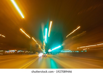 City Colorful Night Lights Perspective Blurred By High Speed Of The Car. A Streak Of Light, Trails.