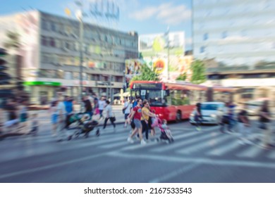 City Commuters. High Key Blurred Image Of People Walking In The Street. Unrecognizable Faces.