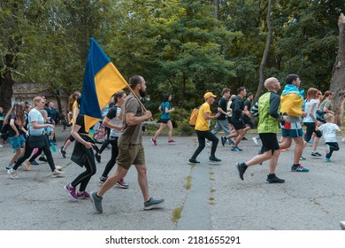 In The City Of Dnipro, A Race Was Held In Support Of The Defenders Of Mariupol. Running For Azovstal. Sports Flash Mob. DNIPRO, UKRAINE - 13 July 2022