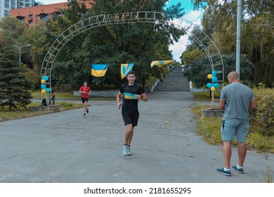 In The City Of Dnipro, A Race Was Held In Support Of The Defenders Of Mariupol. Running For Azovstal. Sports Flash Mob. DNIPRO, UKRAINE - 13 July 2022