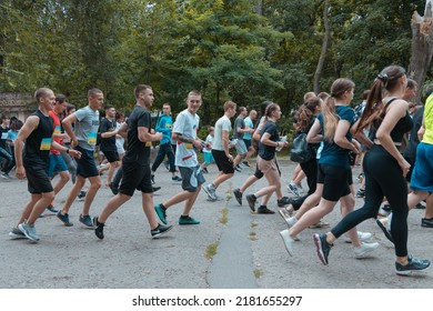 In The City Of Dnipro, A Race Was Held In Support Of The Defenders Of Mariupol. Running For Azovstal. Sports Flash Mob. DNIPRO, UKRAINE - 13 July 2022