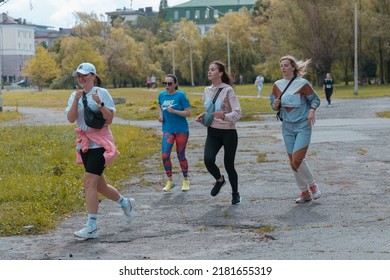 In The City Of Dnipro, A Race Was Held In Support Of The Defenders Of Mariupol. Running For Azovstal. Sports Flash Mob. DNIPRO, UKRAINE - 13 July 2022