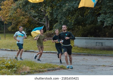 In The City Of Dnipro, A Race Was Held In Support Of The Defenders Of Mariupol. Running For Azovstal. Sports Flash Mob. DNIPRO, UKRAINE - 13 July 2022