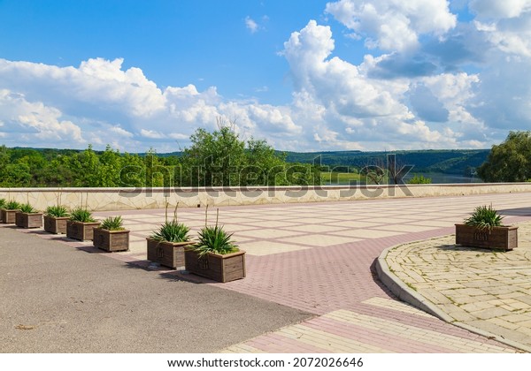 City embankment of the\
river. Urban and nature, background with copy space for text or\
lettering.