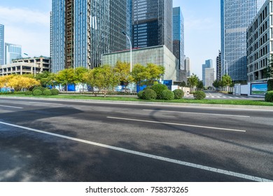 city empty traffic road with cityscape in background - Shutterstock ID 758373265
