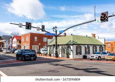 City of Fairfax, USA - March 10, 2020: Downtown old town at University drive, Main street intersection with gift souvenir stores, restaurants and small businesses in Fairfax county, Northern Virginia