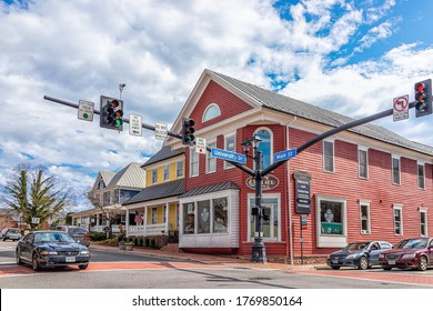 City of Fairfax, USA - March 10, 2020: Old town downtown at University drive, Main street intersection with stores shops and restaurants in Fairfax county northern Virginia