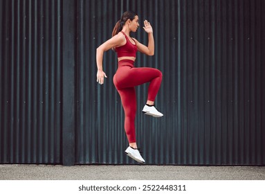 City, fitness and warm up with woman runner outdoor for cardio, training or workout routine. Exercise, running and preparation with sports athlete or person in urban town for start of challenge - Powered by Shutterstock