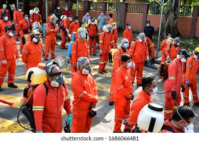 City Hall Health Officials Wearing Protective Suits Disinfect The Entrance Of Sri Petaling Mosque In Kuala Lumpur, Malaysia, 28 March 2020.