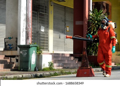 City Hall Health Officials Wearing Protective Suits Disinfect The Entrance Of Sri Petaling In Kuala Lumpur, Malaysia, 28 March 2020.