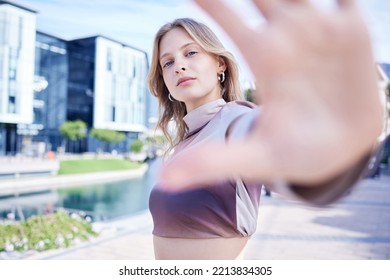 City, Hand Frame And Portrait Of Woman In Street, Model For Fashion, Beauty And Makeup. Summer, Freedom And Trendy Young Girl In The Road Of Urban Town With Hands For Creative, Modern And Edgy Style