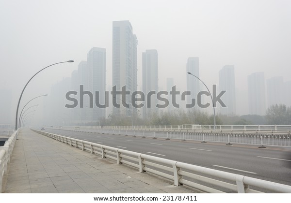 City in a heavy hazy\
weather. The deterioration of air quality resulted in low\
horizontal visibility. Located in Sanhao Bridge, Shenyang City,\
Liaoning Province, China.