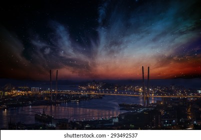 City Landscape At Night With Sky With Stars And Nebula.