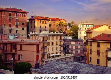 City landscape at sunset of the day in the Italian city of La Spezia. Traditional architecture of Italy. Brick residential buildings of citizens.