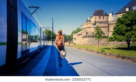 city life in Nantes, tramway and castle Duck of Brittany- France - Powered by Shutterstock