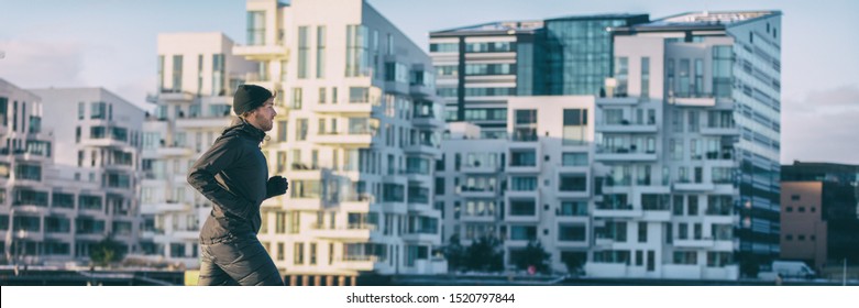 City Lifestyle Winter Run Runner Athlete Man Jogging Outside On Modern Apartment Building Background Panoramic Banner. Running Active Living People Panorama.