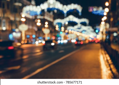 City Lights Big Abstract Circular Bokeh On Dark Background. Street Out Of Focus