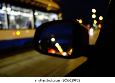 City Lights In A Car Rear View Mirror At Night Defocused