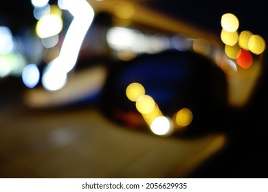 City Lights In A Car Rear View Mirror At Night Defocused