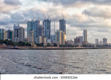 City Line Of Mumbai With Some Lovely Buildings And Rain Clouds In The Background