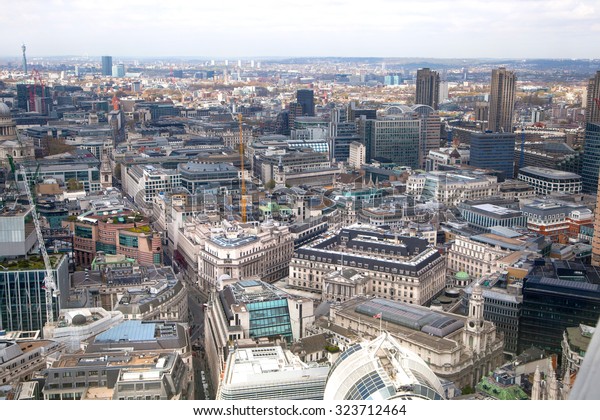 City of\
London aerial view, office buildings and streets. London panorama\
form 32 floor of Walkie-Talkie\
building