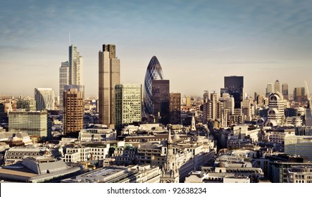 City Of London One Of The Leading Centers Of Global Finance And Canary Wharf At The Background.