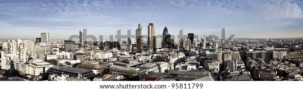 City of London one of the leading centres of\
global finance. This panoramic view includes Tower 42,\
Gherkin,Willis Building, Stock Exchange Tower, Lloyd`s of London,\
the Tower Bridge and Canary\
Wharf.