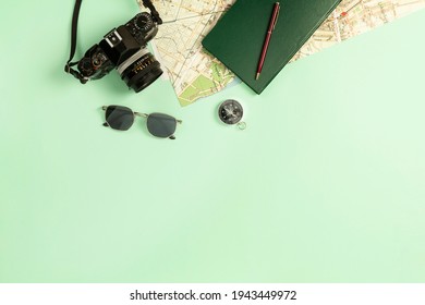 city map old camera notepad on turquoise background