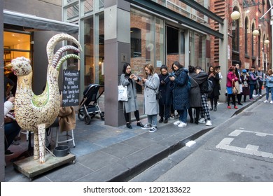 City Of Melbourne, VIC/Australia-July 19th 2018: Crowds Of Asian Tourists Waiting In Queue Outside Cafe To Be Seated.