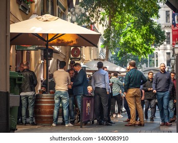 City Of Melbourne, VIC/Australia-May 17th 2019: Crowds Of Men Drinking And Talking Outside A Tavern In CBD.